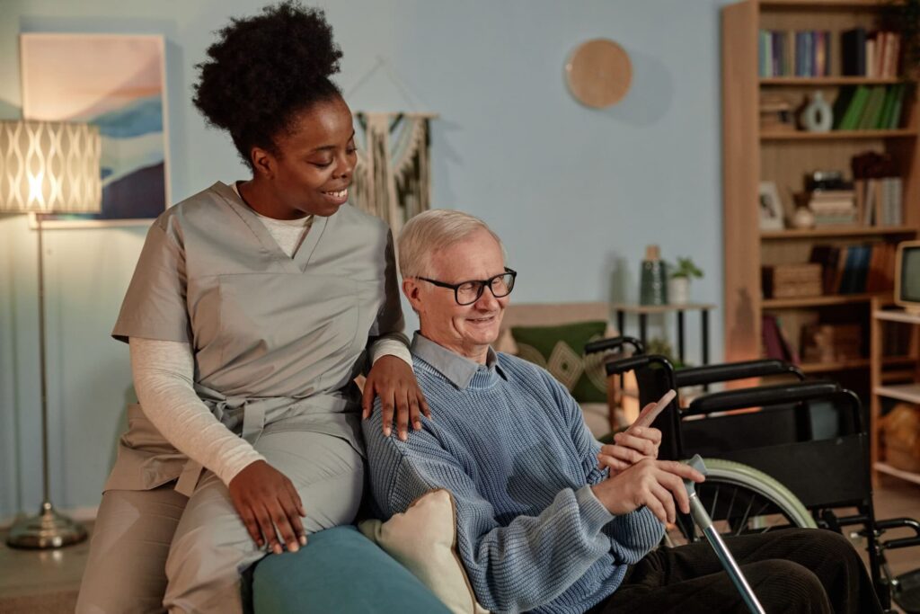 black female caregiver assisting elderly man provi 2025 02 14 17 44 41 utc scaled